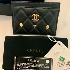 Sold!! Chanel Lambskin Lucky Charms card holder